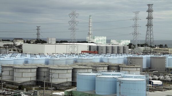In this Oct. 12, 2017, photo, ever-growing amount of contaminated, treated but still slightly radioactive, water at the wrecked Fukushima Dai-ichi nuclear plant is stored in about 900 huge tanks, including those seen in this photo taken during a plant tour at Fukushima Daiichi Nuclear Power Plant in Okuma, Fukushima Prefecture, northeast of Tokyo - Sputnik International