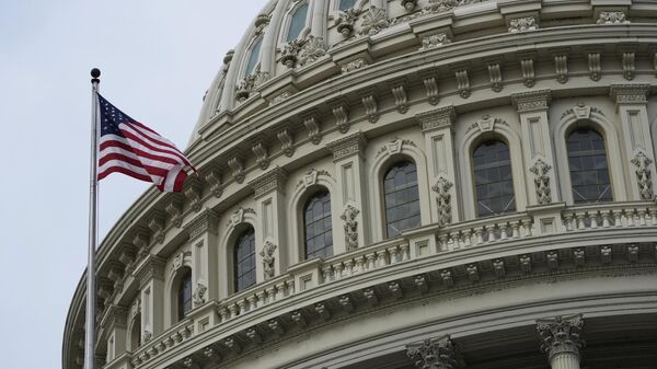 American flag flies on the U.S. Capitol in Washington, Wednesday, Jan. 4, 2023. - Sputnik International