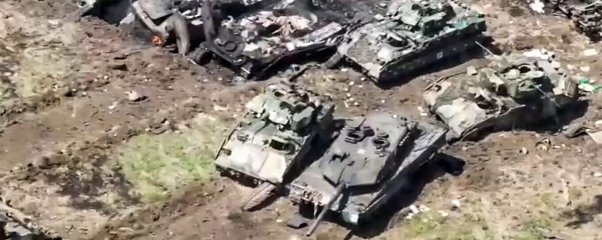 Leopard 2 and Bradley pictured among destroyed and damaged Ukrainian vehicles. Screenshot of Russian Defense Ministry video. - Sputnik International, 1920, 09.07.2023