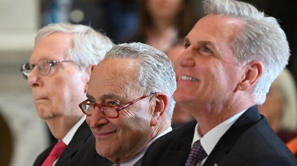(L to R) Senate Minority Leader Mitch McConnell (R-KY), Senate Majority Leader Chuck Schumer (D-NY), and US House Speaker Kevin McCarthy (R-CA),  attend a portrait unveiling for former house speaker Paul Ryan in Statuary Hall at the US Capitol in Washington, DC on May 17, 2023. - Sputnik International