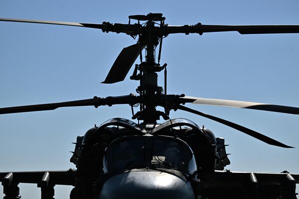 The Ka-52, also known as the Alligator scout-attack helicopter, in combat action in the special op zone. - Sputnik International